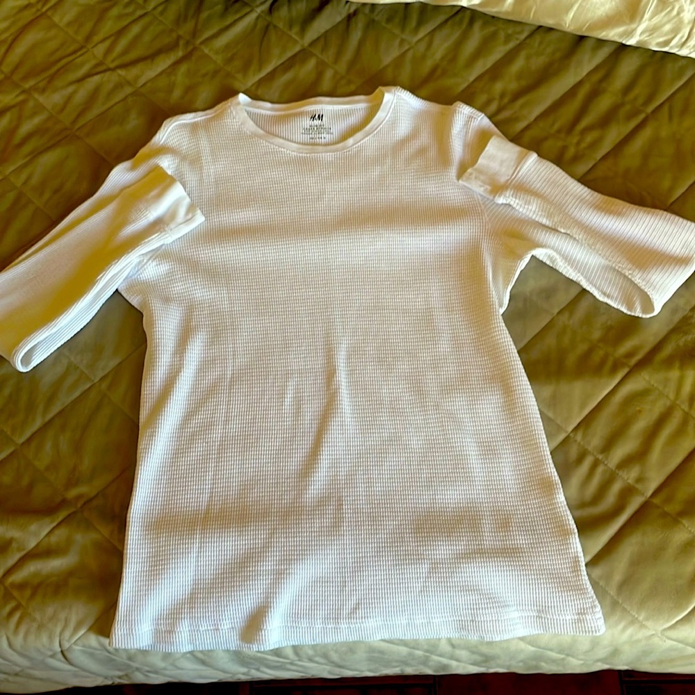 White dressy patterned long sleeve shirt.